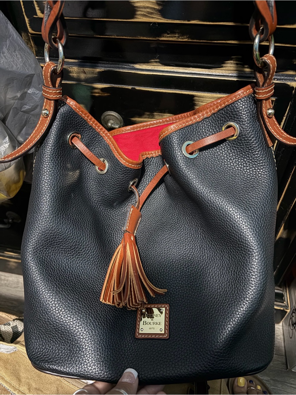 Dooney & Bourke Black Pebbled Leather Drawstring Shoulder Bag with Brown Trim